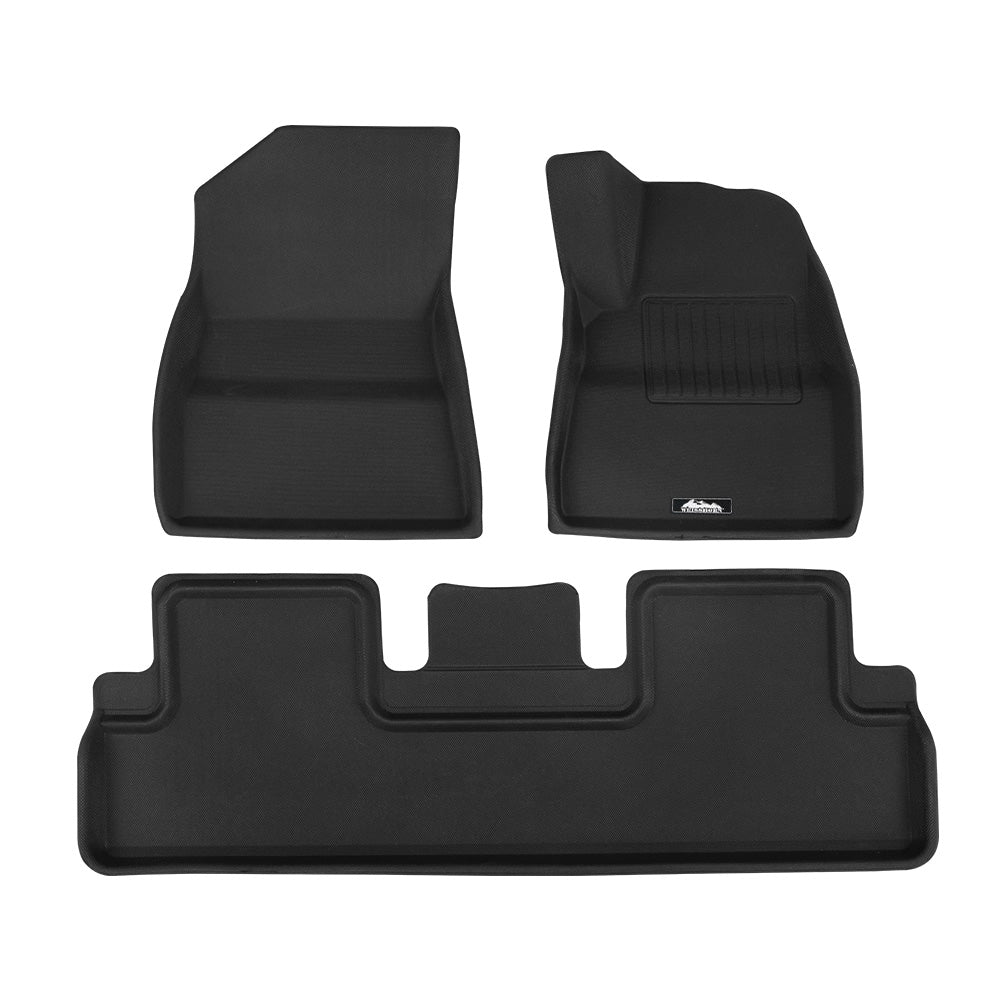 Set of black car floor mats on a white background