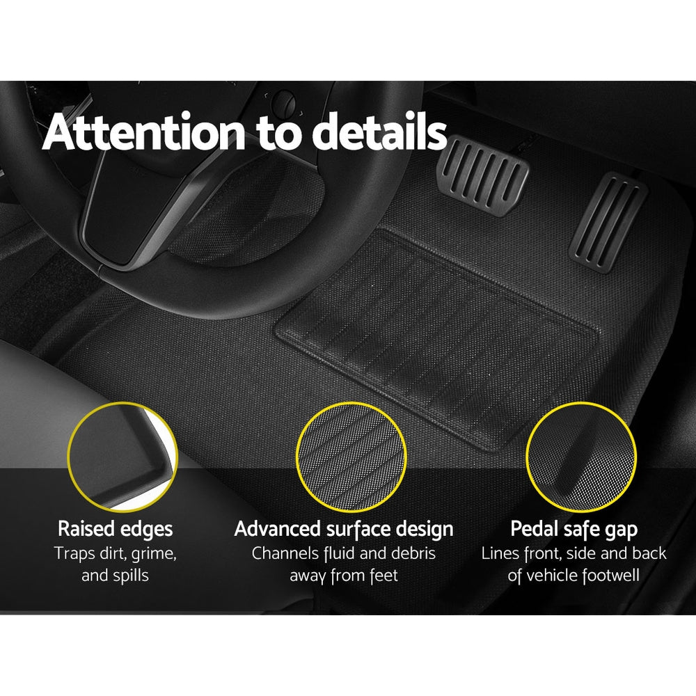 Car interior with black floor mats highlighting features like raised edges, advanced surface design, and pedal safe gap.