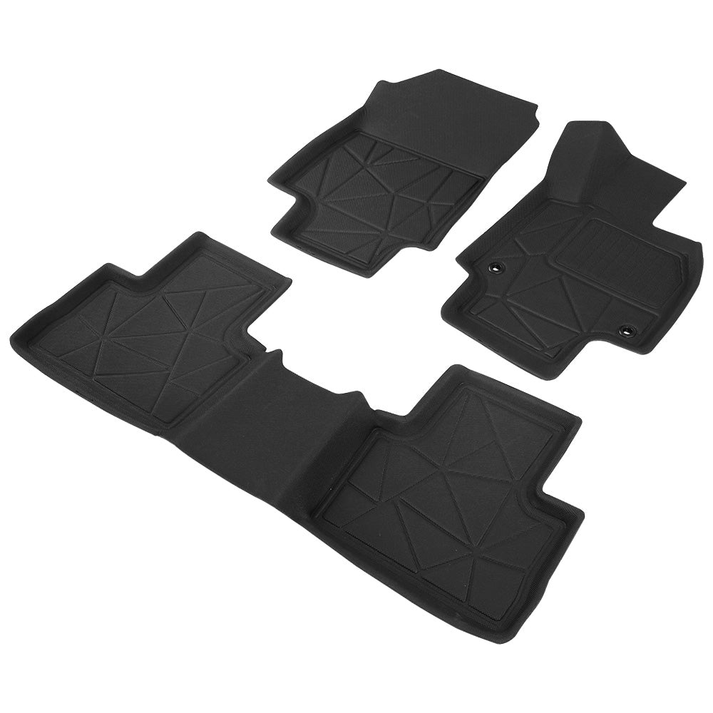 Set of black car floor mats on a white background