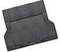 Black car boot mat with textured pattern on a white background
