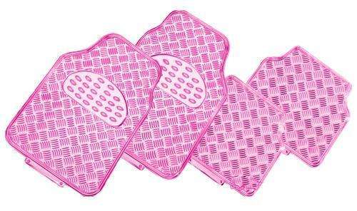 Set of pink silicone mats with textured designs on a white background