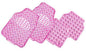 Set of pink silicone mats with textured designs on a white background