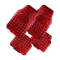 4 Red rubber car mats with a textured pattern on a white background