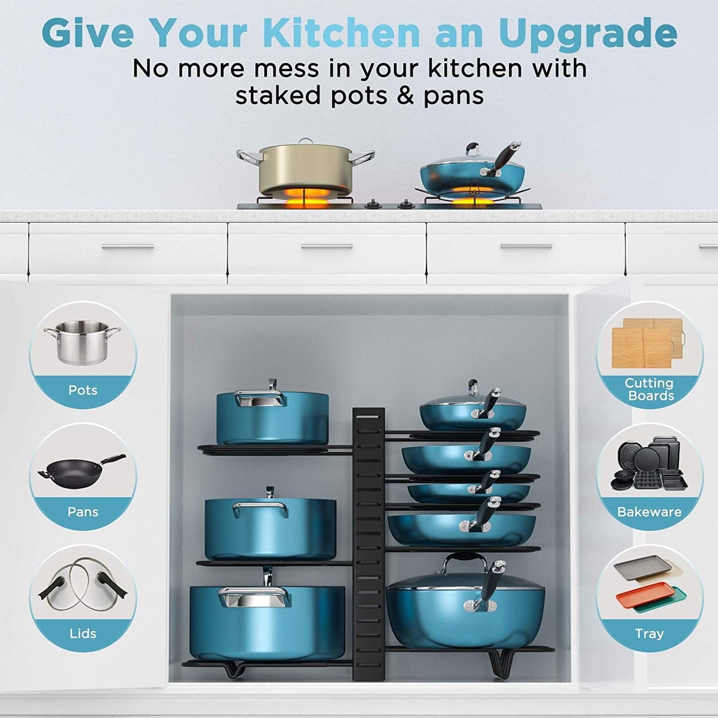 Kitchen setup with staked pots and pans on a stove, showing storage solution for kitchenware.
