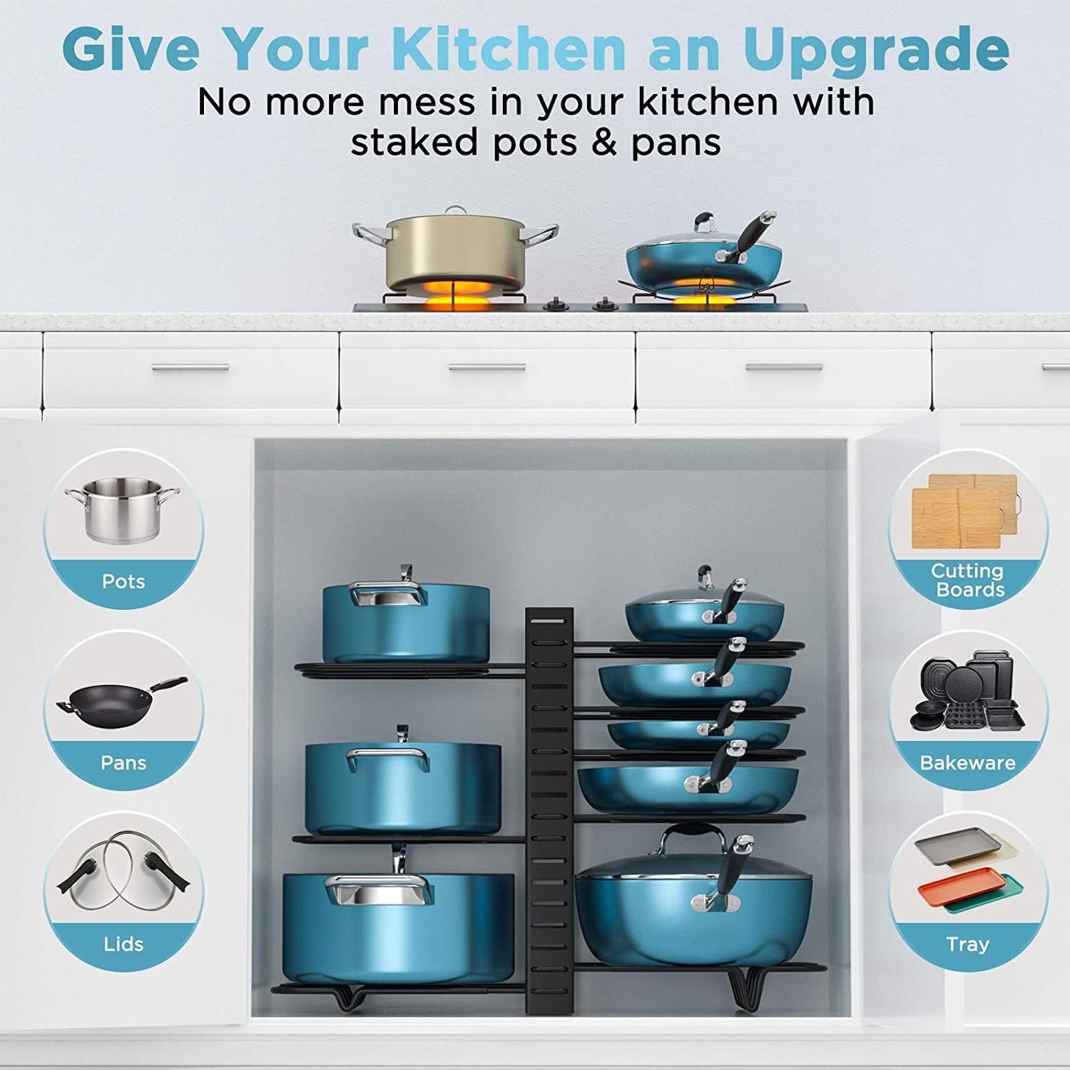 Kitchen setup with staked pots and pans on a stove, showing storage solution for kitchenware.