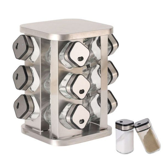 Stainless steel rotary spice rack with glass containers on a white background