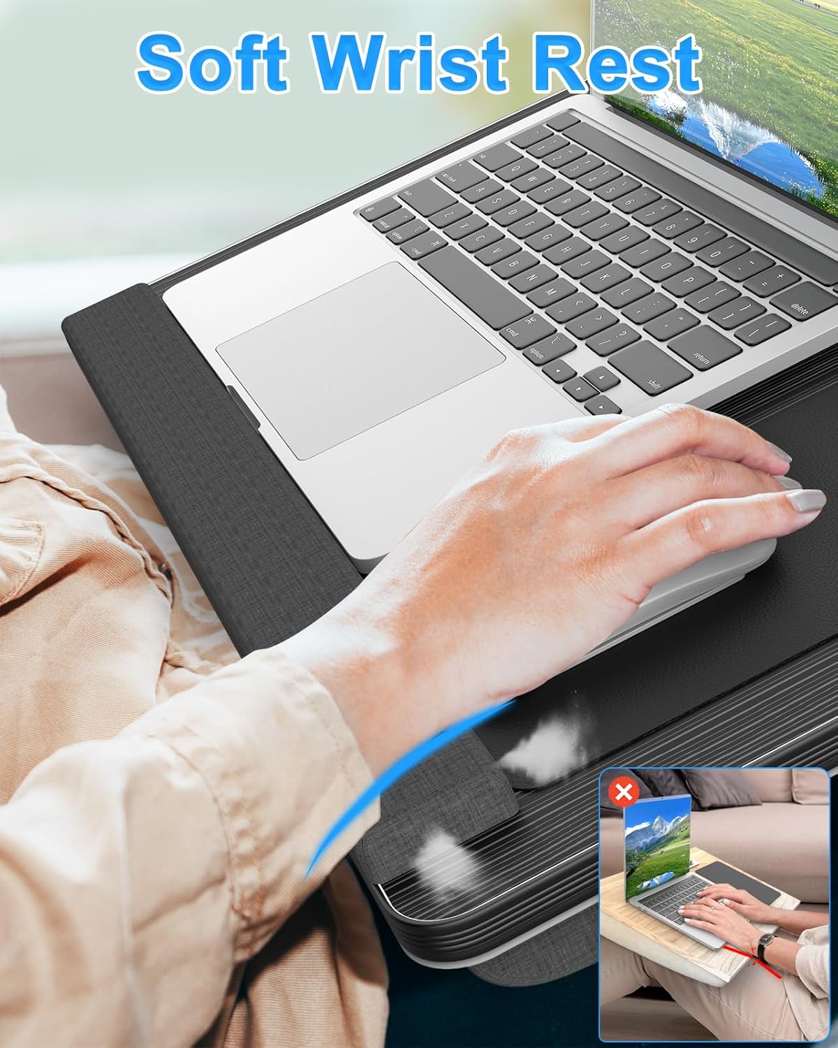 Laptop on a soft wrist rest with a person using it, emphasizing comfort.
