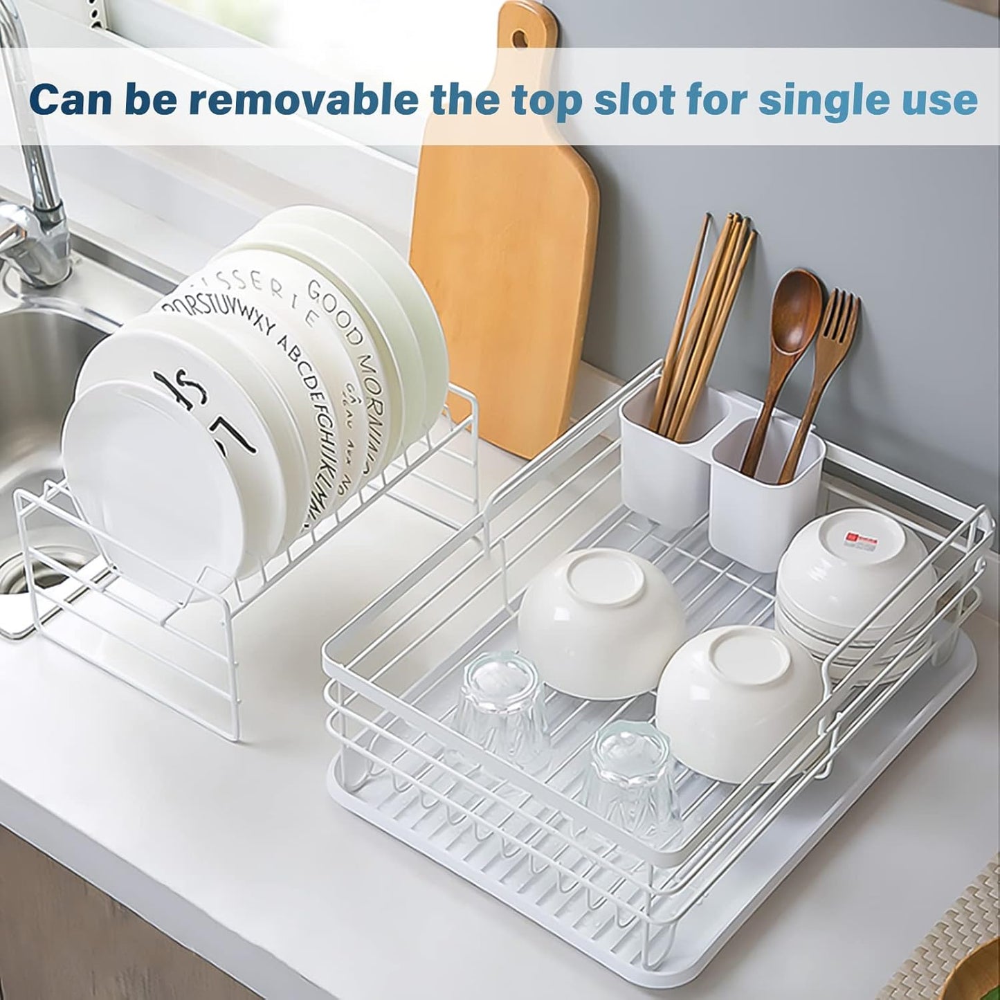 Dish drying rack with dishes and utensils on a kitchen counter