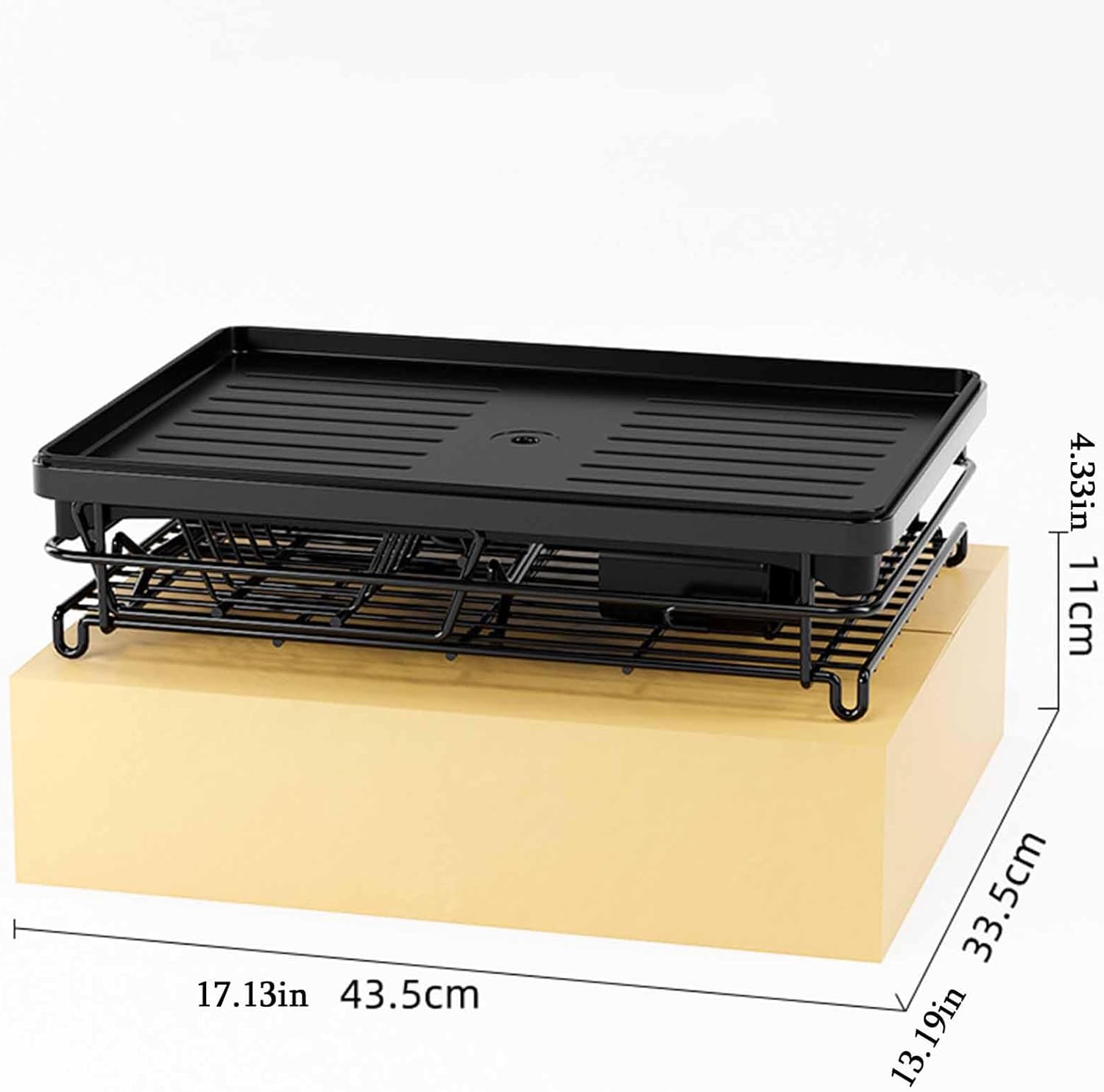 Black grill with dimensions labeled on a white background