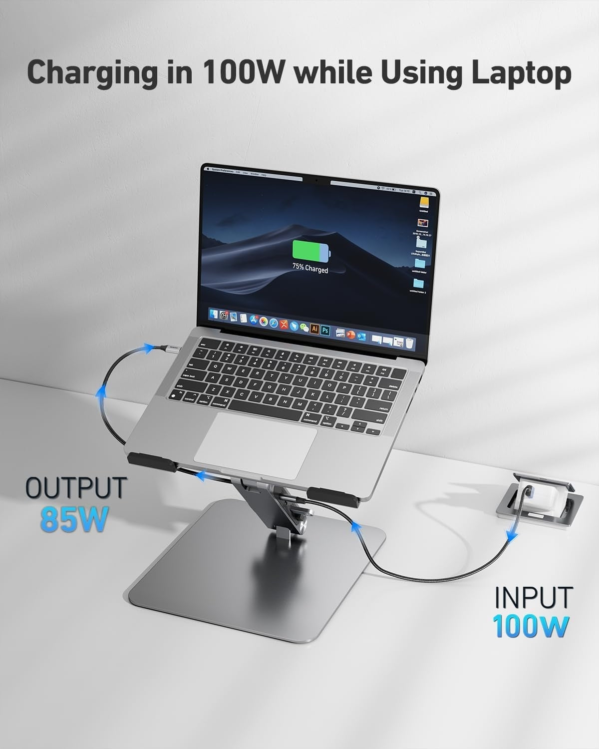 Laptop on a stand with charging cable, displaying power output and input information.
