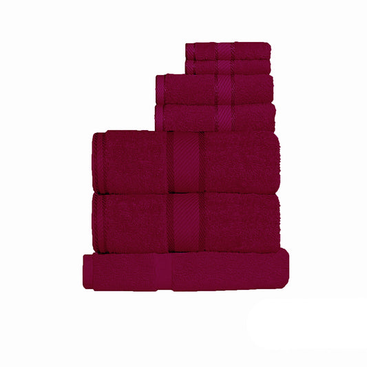 Set of burgundy towels stacked on a white background