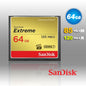 SanDisk Extreme 64GB CompactFlash card on a reflective surface with a gray background